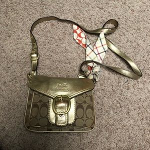 Super cute Gold classic Coach cross body bag